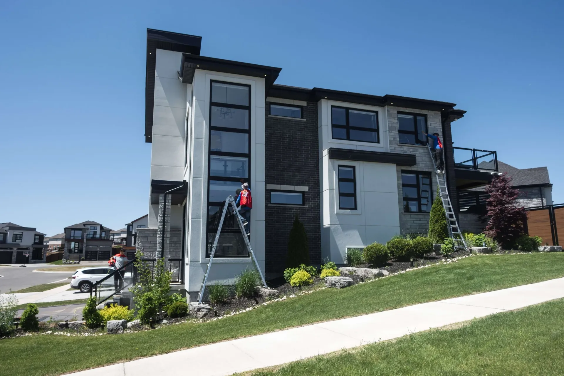 Professional window cleaning on a modern home in Kitchener-Waterloo